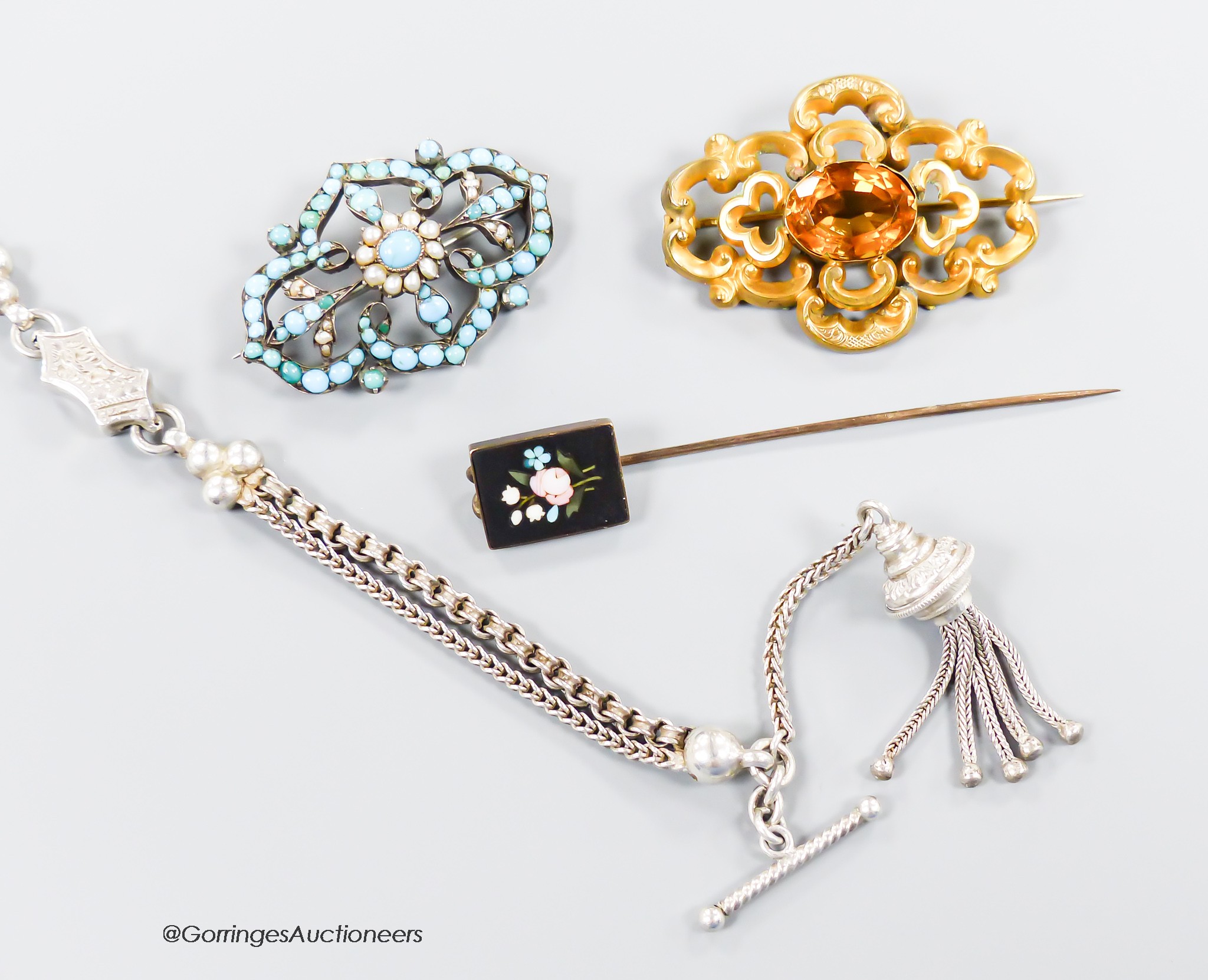 A George V silver albertina, 27cm, an Edwardian yellow metal and citrine brooch, a turquoise and seed pearl brooch and a yellow metal and pietra dura set stick pin.